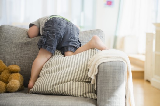 Child on cushion